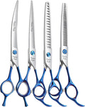Four dog grooming scissors with blue handles and a metal comb