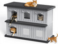 Black double-decker insulated outdoor cat house with balcony