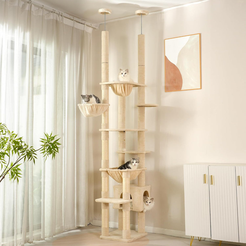Floor to ceiling dual post cat tree with hammocks and condo in a corner