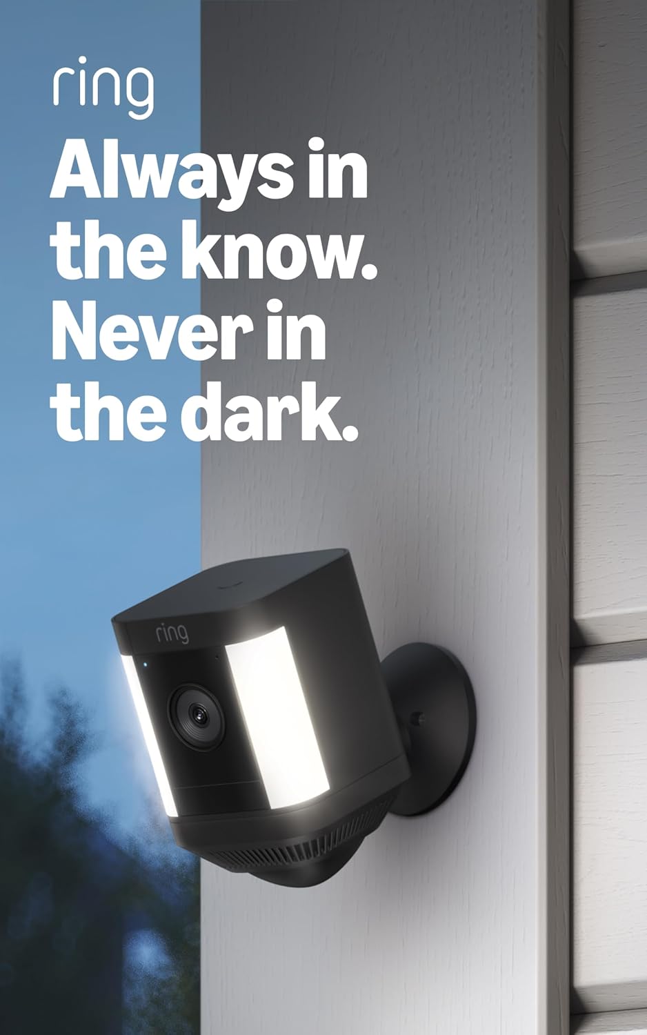 Black wireless home security camera with motion LED lights mounted outdoors