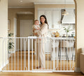 Extra wide pressure mounted walk-through dog gate across a doorway