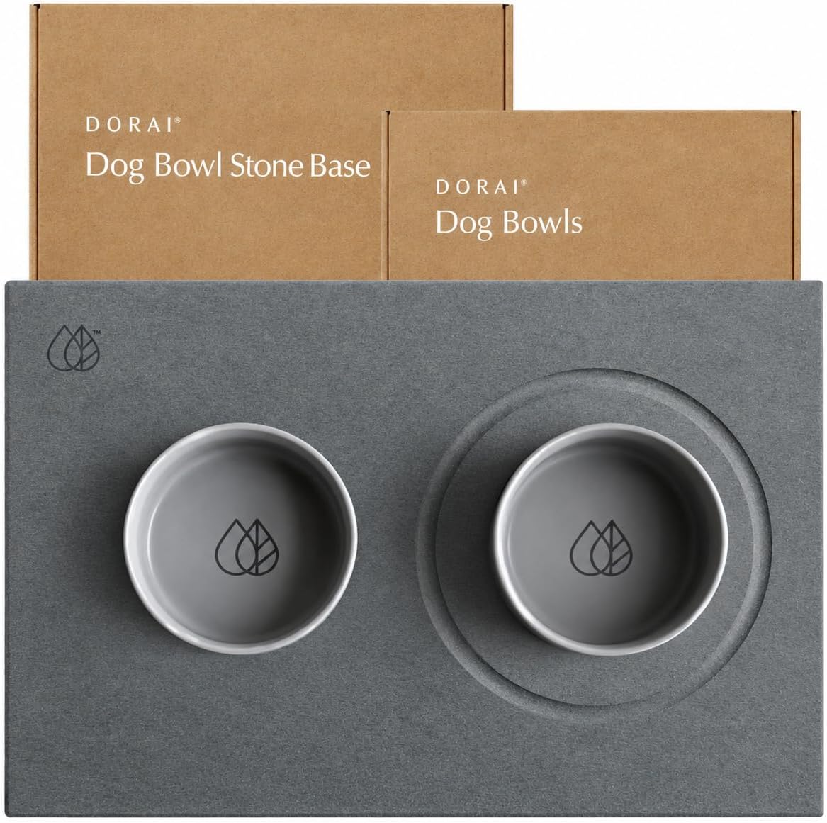 Two ceramic dog bowls on a slate stone drying mat