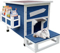 Blue weatherproof wooden outdoor cat shelter with escape door – view 4