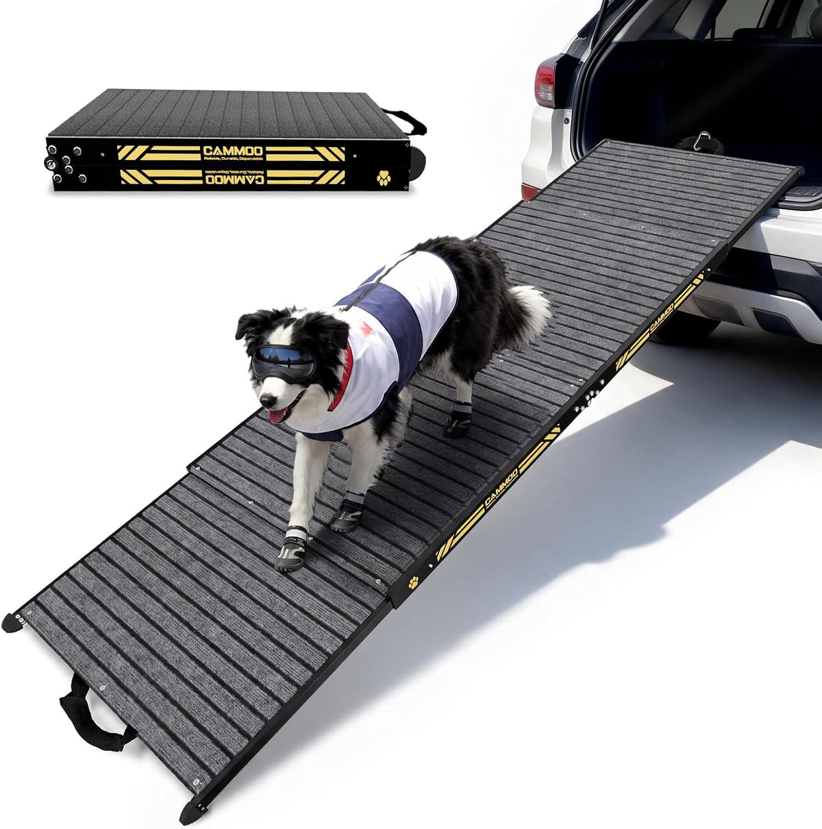 Foldable aluminum dog ramp leading into an SUV
