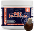 Tub of moldable pill wrap treat paste with a pill pocket formed by hand – view 9