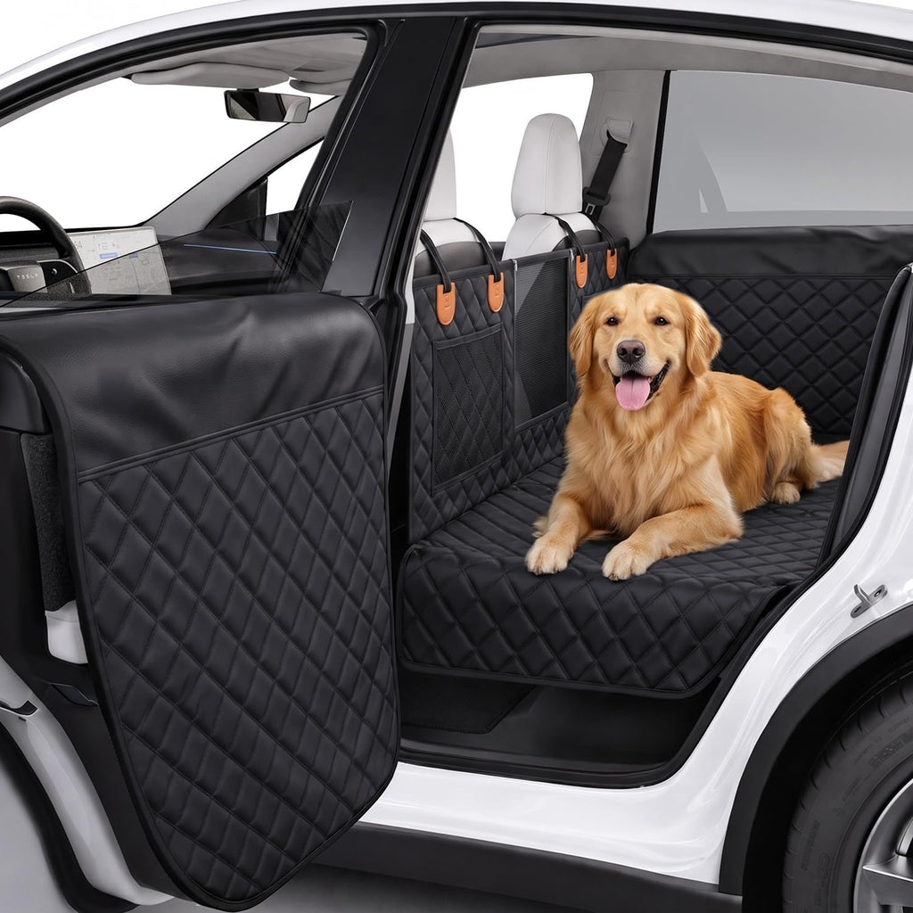 Black and orange hard bottom pet seat liner installed in a car back seat