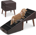 Foldable upholstered dog ramp that converts into an ottoman beside a couch