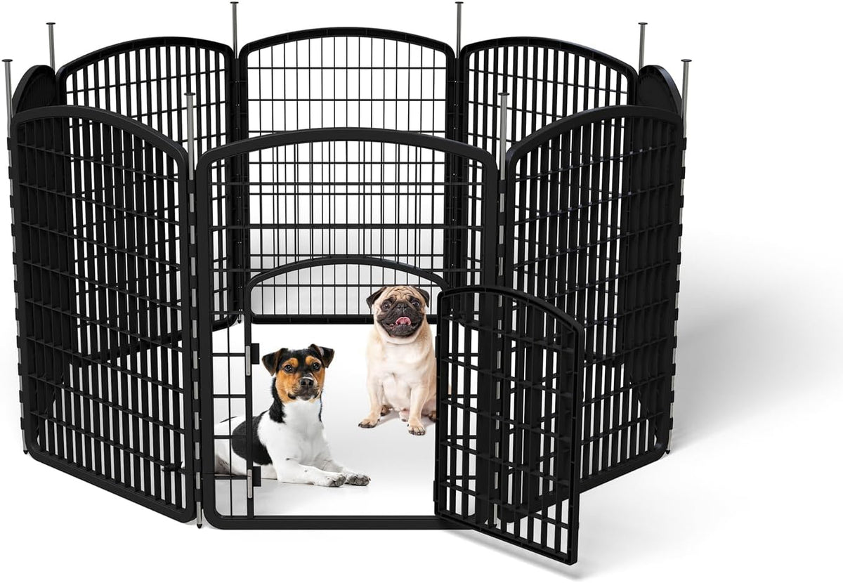 Black 12-panel metal dog playpen with door set up on a lawn – view 2