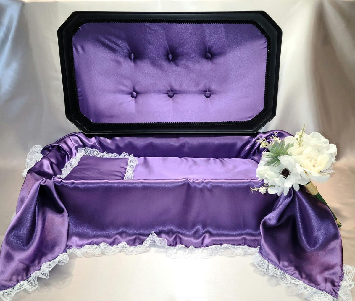 Black and purple medium pet burial casket with domed lid