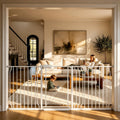 Extra wide clear acrylic pressure mounted dog gate in a doorway