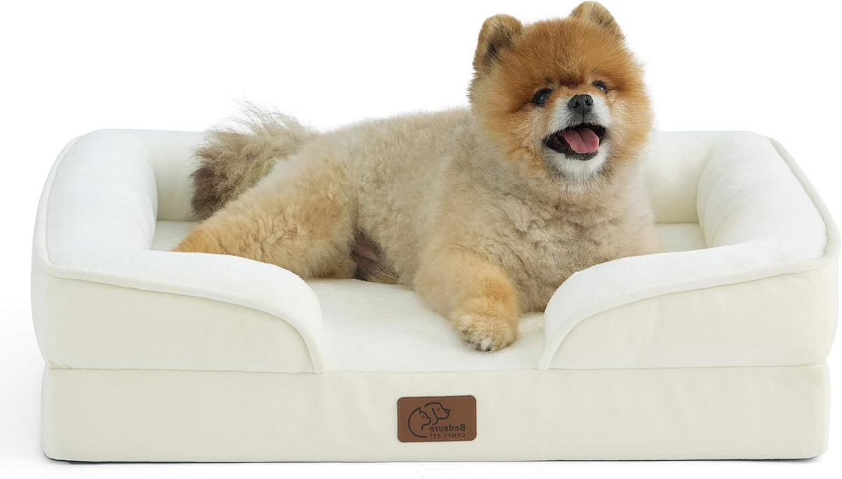 Beige 24 inch orthopedic couch-style small dog bed with bolster sides