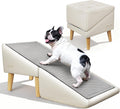 Foldable ottoman-style dog ramp and steps with non-slip surface beside a couch
