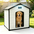 Cement gray extra large plastic dog house with sloped roof and vents