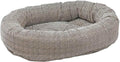 Medium herringbone oval donut dog bed with tufted cushion