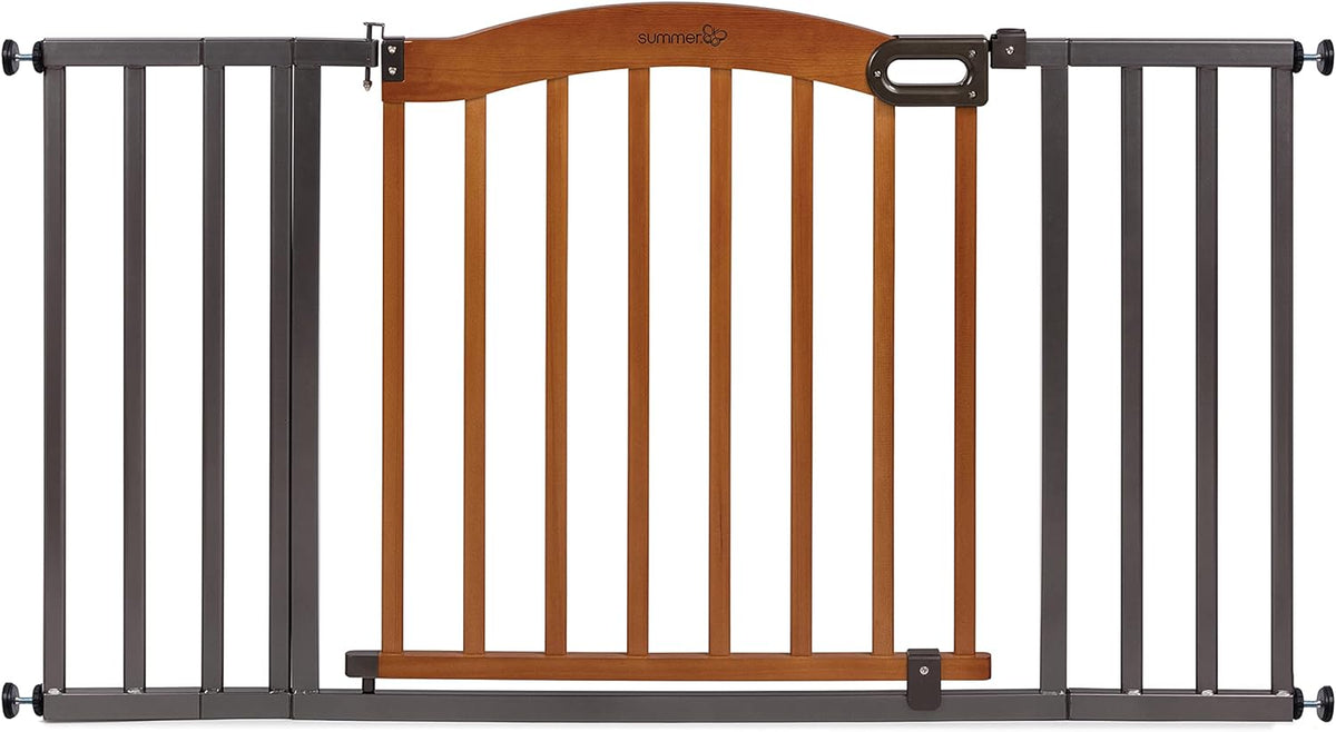 Walnut wood and charcoal metal walk-through pet gate in a doorway