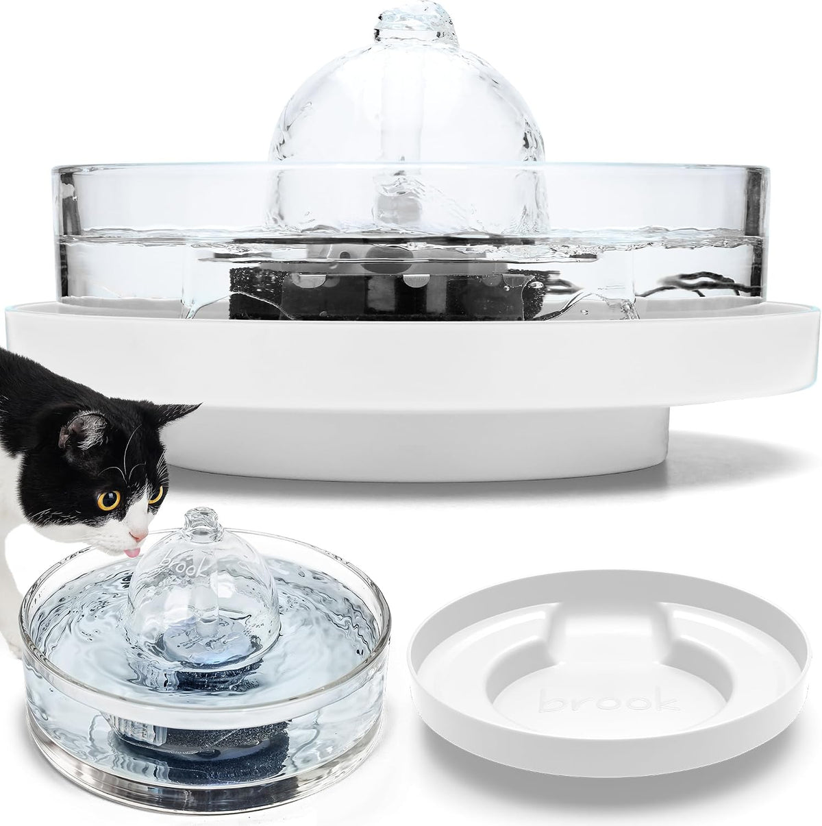 Glass cat water fountain on a white raised stand