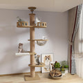 Brown floor-to-ceiling sisal rope cat tree with hammock