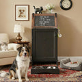 Black pet feeding station cabinet with two elevated bowls