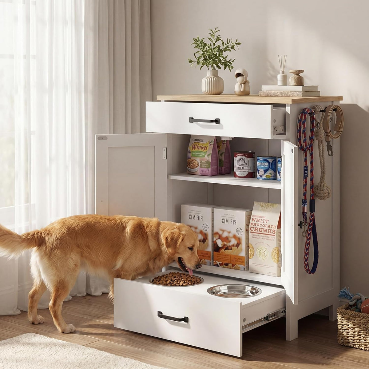White wooden dog food storage cabinet with pull-out stainless bowl tray
