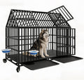 Black heavy duty steel dog crate with peaked roof on lockable wheels