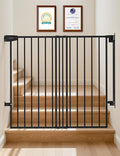 Black extra tall hardware mounted dog gate with no bottom bar at the top of stairs