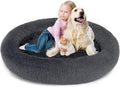 Dark grey round plush faux fur donut dog bed with raised rim