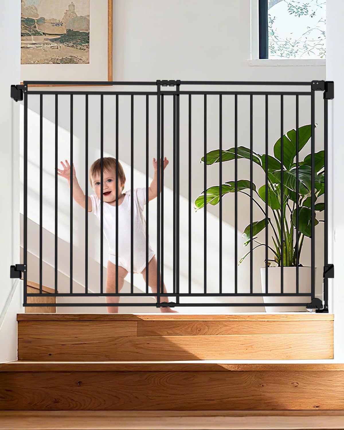 Black no bottom bar pet gate with walk-through door mounted at top of stairs