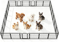 Black metal 24 panel dog exercise pen set up in a yard