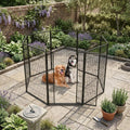 Black 48 inch 8-panel metal dog exercise pen in a garden