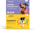 Dog DNA test kit box with cheek swab and sample tube for breed and age testing