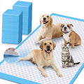 Stack of extra large blue absorbent dog training pads