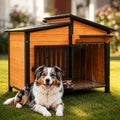Brown outdoor dog house with asphalt roof, PVC door flap and attached pet bowl