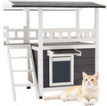 Insulated wooden cat house with asphalt roof and raised platform – view 2