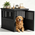 Black resin dog crate furniture used as a sofa side table