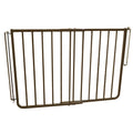 Brown aluminum outdoor gate mounted at the top of deck stairs