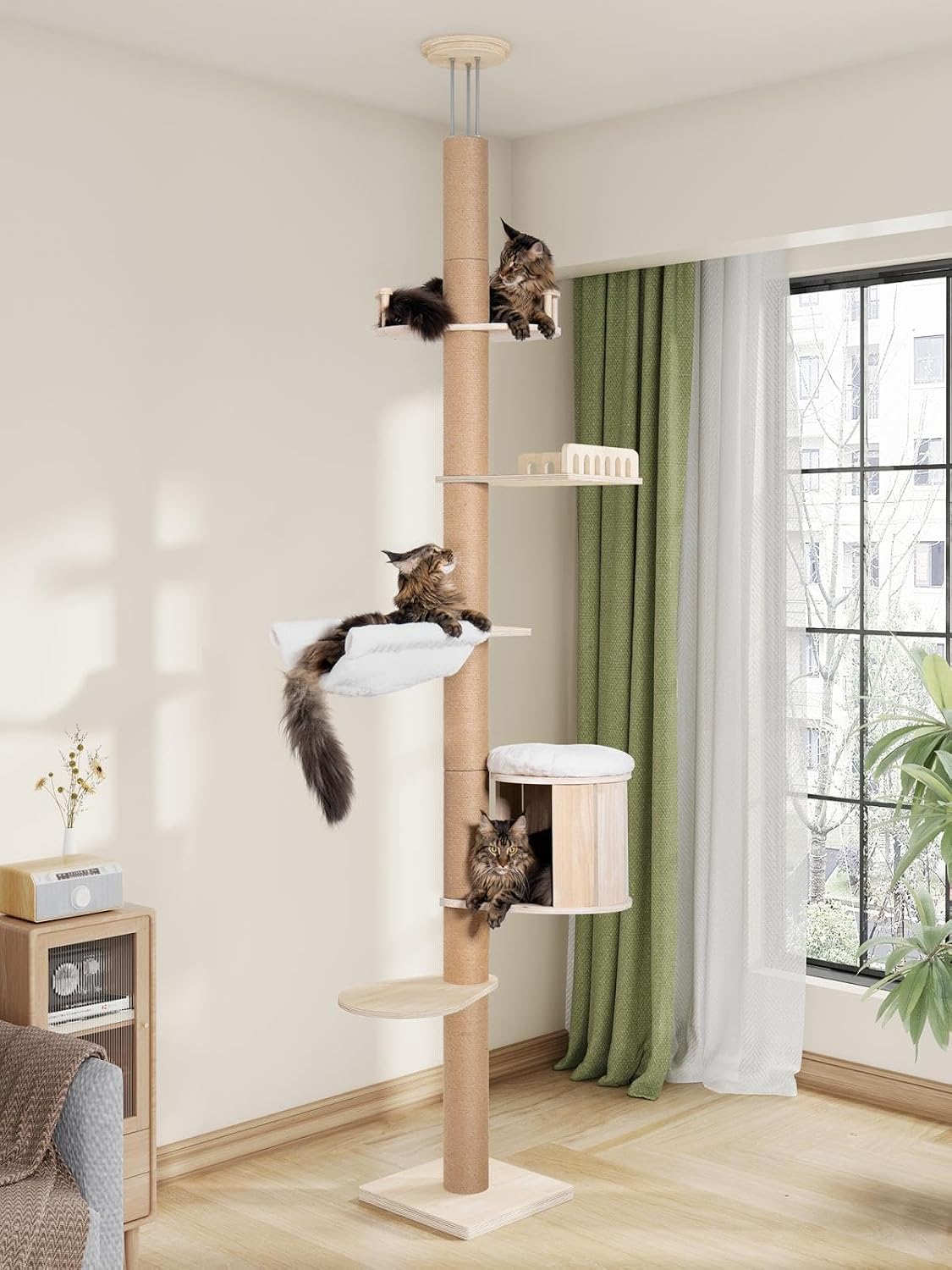 Wooden floor-to-ceiling cat tower with condo and hammock