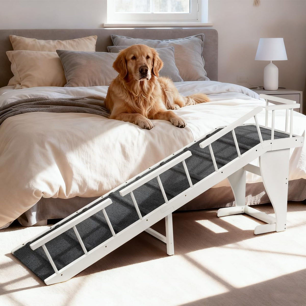 Widened dog ramp with safety rail leaning against a bed