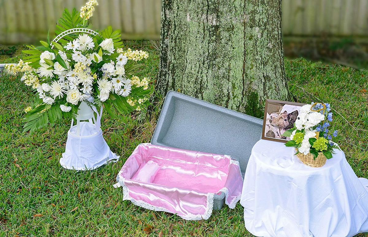 Medium pet burial casket vault with pink satin bedding and lace pillow