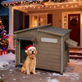 Grey wooden dog house with openable roof and side window