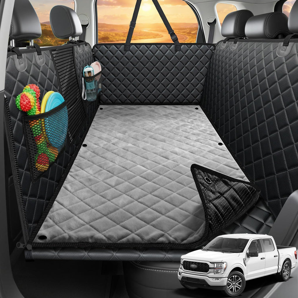 Black hard bottom dog back seat extender with high mesh barrier in a car rear seat – view 5