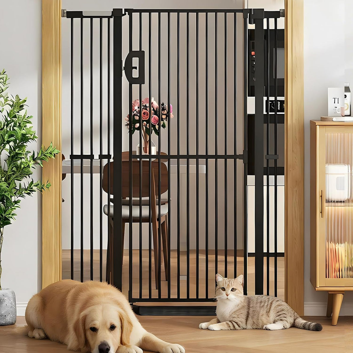 Black 57 inch extra tall pet gate with walk-through door at stairs