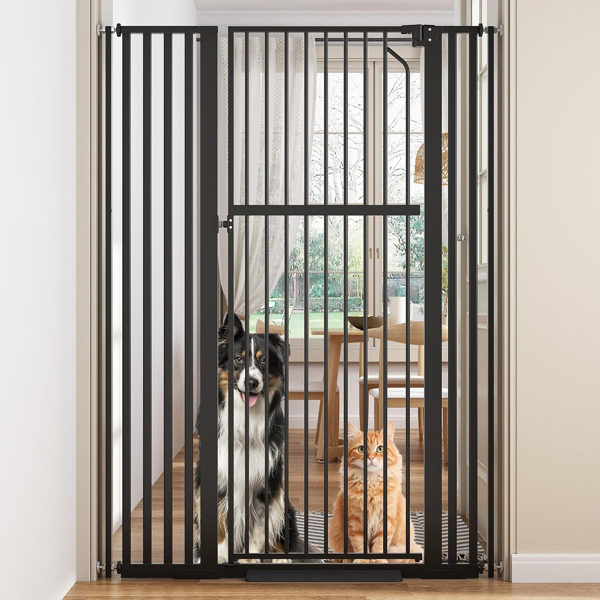Black extra tall iron pet gate in a hallway doorway