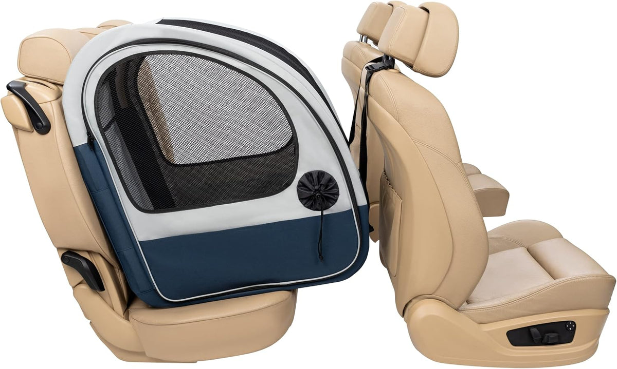 Collapsible mesh travel dog crate on a car back seat