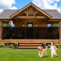 Black retractable mesh dog gate stretched across a wide doorway