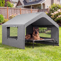 Extra large elevated dog cot bed with waterproof shade canopy in a backyard