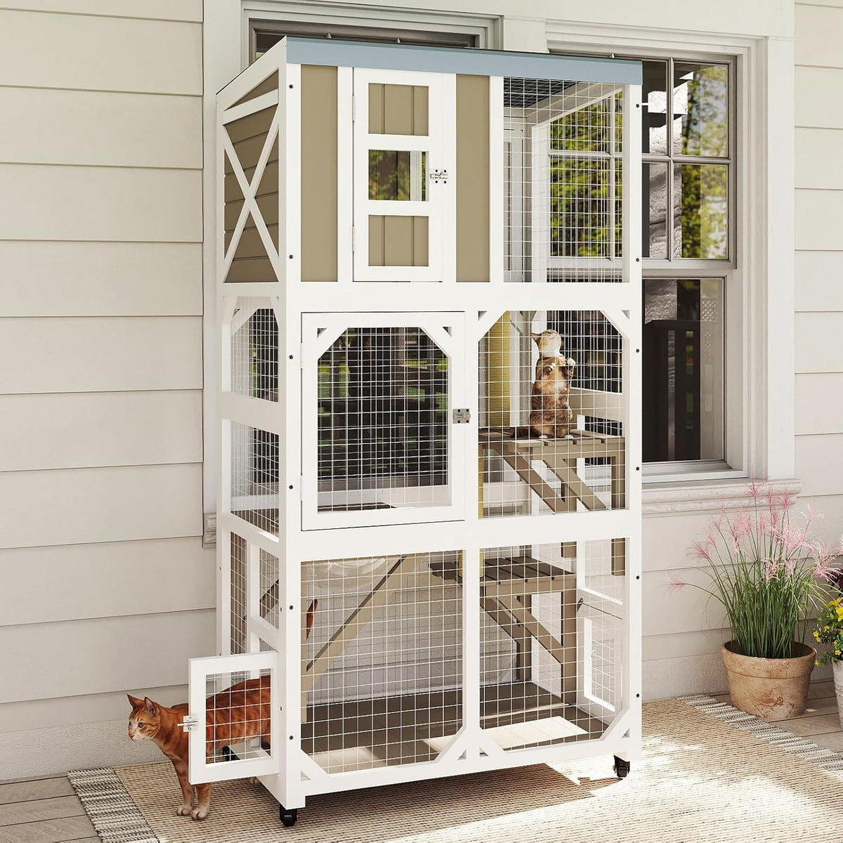 Gray wooden outdoor catio on wheels with platforms and clear capsule bed
