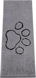 Beige absorbent chenille dog door mat with paw prints at an entryway