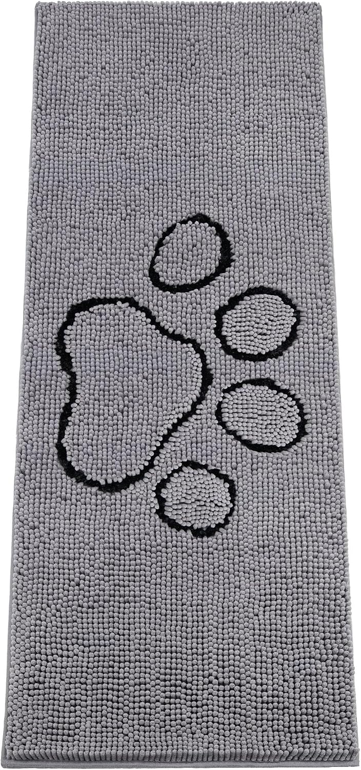 Beige absorbent chenille dog door mat with paw prints at an entryway