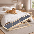Dog ramp with side guardrails leading up to a couch