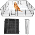 16 panel black metal dog playpen with gate set up in a yard